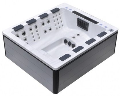 Grijze ombouw van grote design jacuzzi